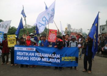 Aksi kampanye Koalisi Rakyat untuk Keadilan Perikanan (KIARA) beberapa waktu lalu. (Foto: Dok. KIARA)