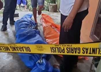 Jenazah Muslimah dan Marjuki di rumah korban. Foto:Bacaini/Budi S