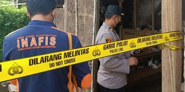 TKP pembunuhan dipasang garis polisi. Foto: Bacaini/A.Ulul