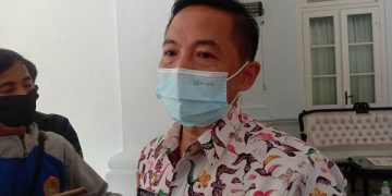 Kepala Dinas Sosial Kabupaten Bangkalan, Wibagio Suharta. Foto: Bacaini/Rusdi