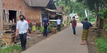 Polisi melakukan olah TKP di lokasi digelarnya pertunjukan kuda lumping. Foto: Bacaini/A.Ulul