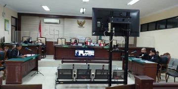 Sidang perdana kasus tipikor BPNT Disos Kota Kediri digelar secara daring. Foto: Ist