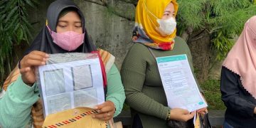 Salah satu korban trading bodong usai melapor di Mapolres Kediri Kota. Foto: Bacaini/AK.Jatmiko