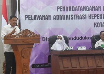 Penandatanganan kesepakatan bersama Layanan Administrasi Kependudukan dan Kesehatan. Foto: Ist