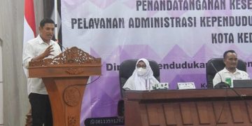 Penandatanganan kesepakatan bersama Layanan Administrasi Kependudukan dan Kesehatan. Foto: Ist