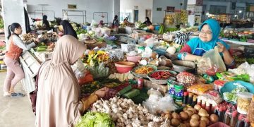 Ilustrasi pedagang di pasar tradisional Kediri. Gambar tidak terkait berita. Foto: Bacaini