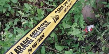 Lokasi pesta miras warga Karangploso dipasang garis polisi. Foto: Bacaini/A.Ulul