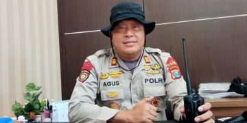 AKP Agus, polisi yang langgar aturan demi temukan jasad korban tenggelam. Foto: Bacaini/AK.Jatmiko