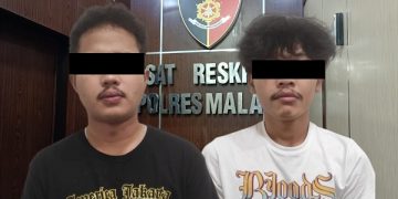 Dua tersangka yang telah diamankan di Polres Malang. Foto: Ist