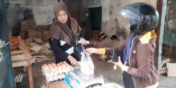 Harga Telur Kembali Naik, Pelaku UMKM Kue Basah Menjerit. (foto/Bacaini)