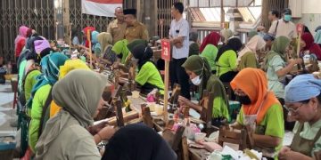 Pabrik Rokok di Trenggalek Cairkan THR Lebaran 2025 Rp 2,8 M (foto/Bacaini)