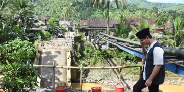 Jembatan Vital di Trenggalek Runtuh, Jalur Antar Kecamatan Lumpuh (foto/Bacaini)