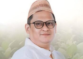 Khairul Umam alias Haji Her.