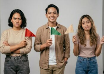 Ilustrasi simbol bendera merah, hijau, beige, dan hitam sebagai tanda hubungan ala Gen Z