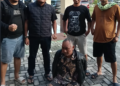Ashari (bawah) sesaat usai penangkapan. Foto: istimewa