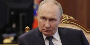 In this pool photograph distributed by the Russian state agency Sputnik, Russia's President Vladimir Putin meets with Belgorod Region Governor in Moscow on July 11, 2025. (Photo by Mikhail METZEL / POOL / AFP) (Photo by MIKHAIL METZEL/POOL/AFP via Getty Images)