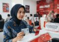 Ilustrasi proses verifikasi wajah saat registrasi nomor HP baru sesuai aturan Komdigi
